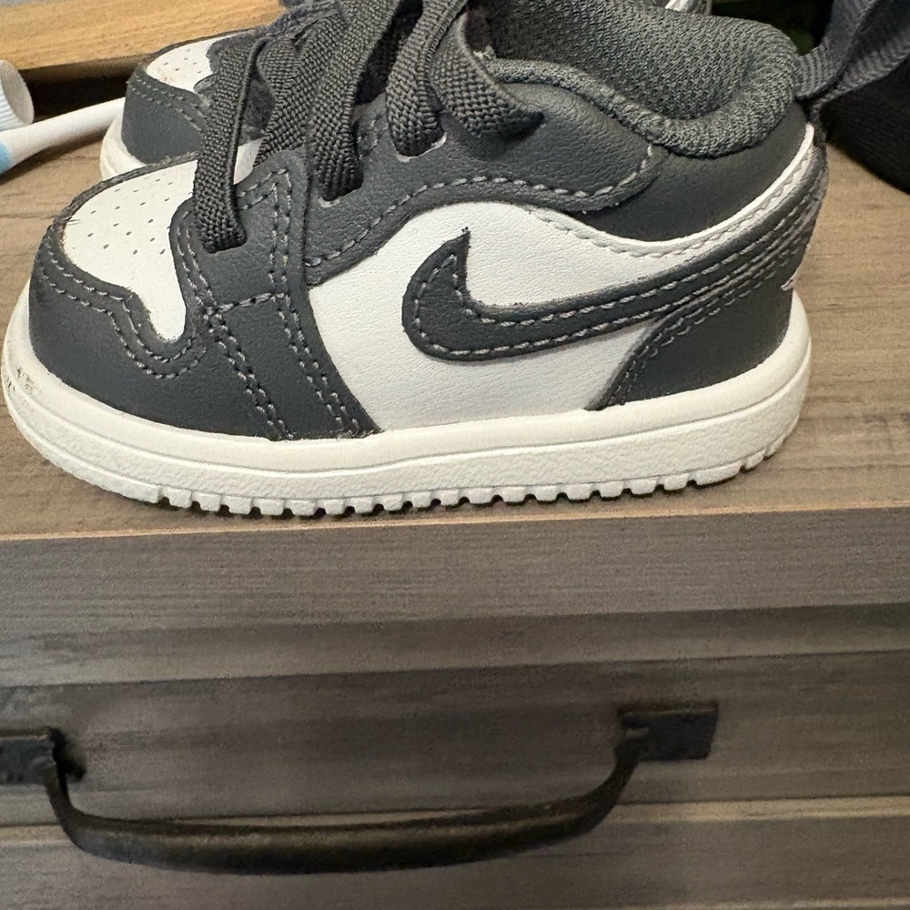 Kids Gray and White Nike Sneakers